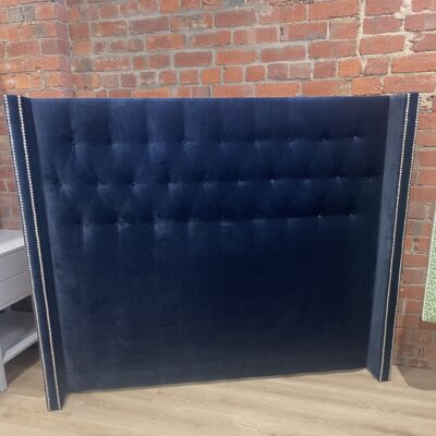 Queen Waldorf bedhead in Dora Midnight velvet