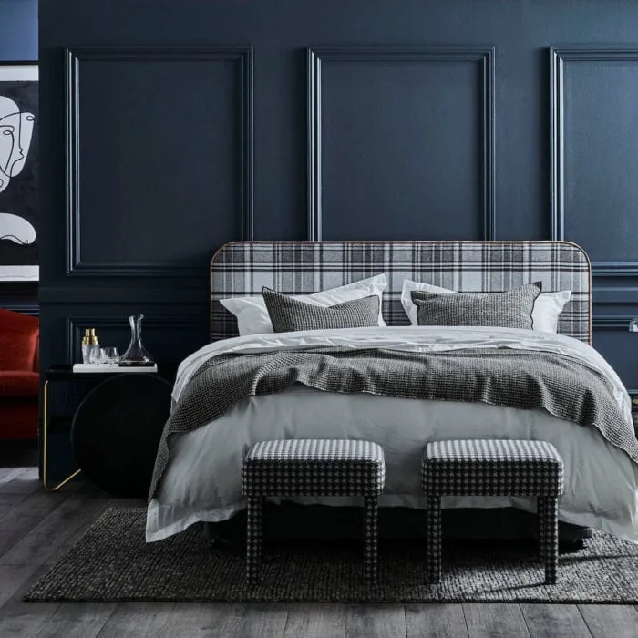 Louis oversized bedhead in Plaid Granite with tan leather piping