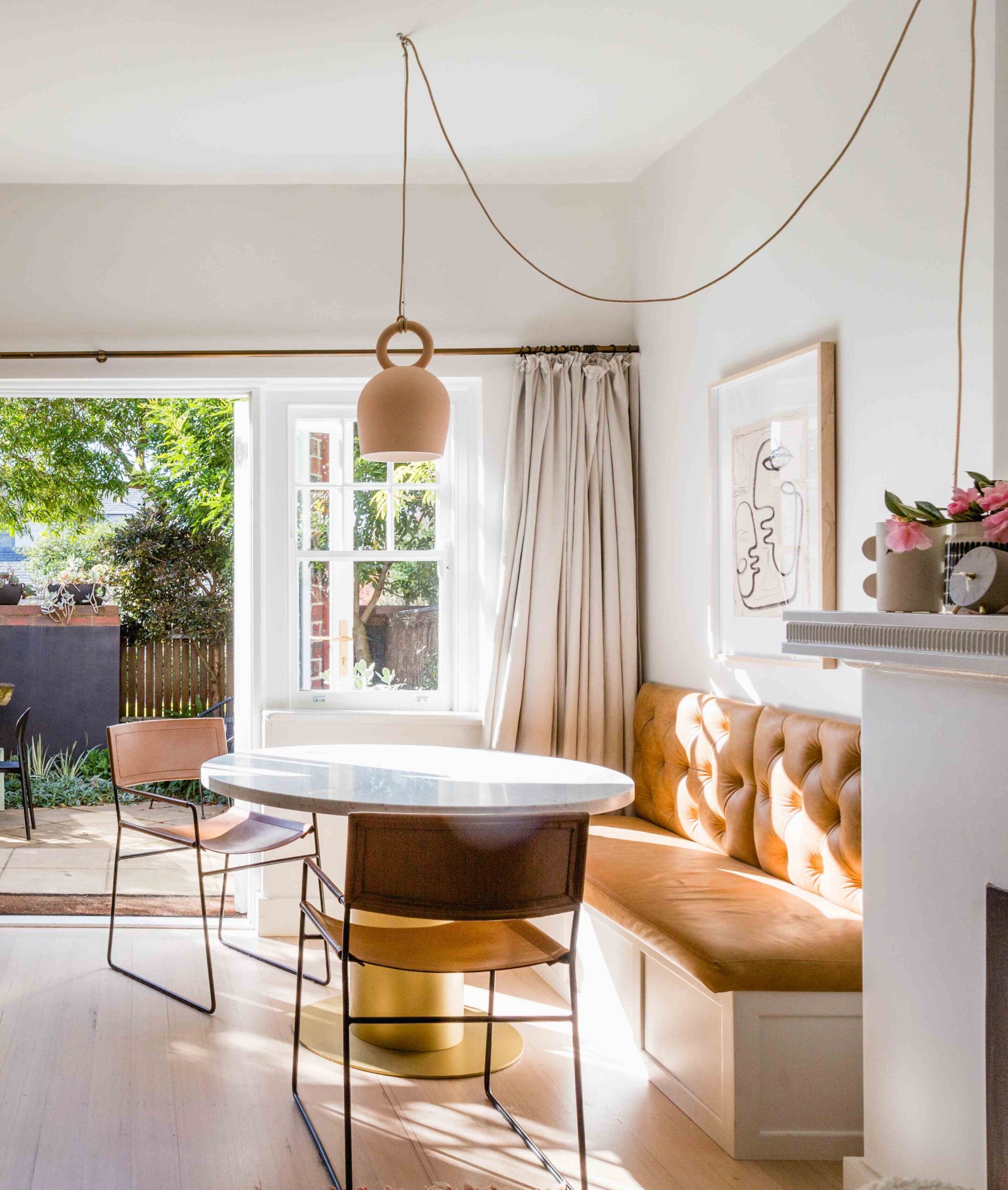 Banquet seat with round marble table