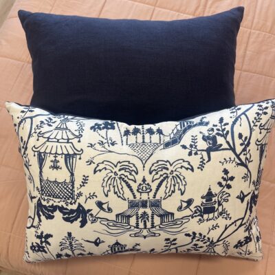 Two cushions in pattern and navy